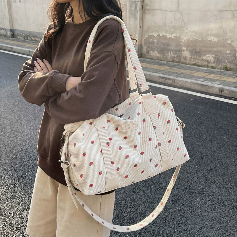 Corduroy reistas met grote cap - Sack Race Bag recensie en prijs